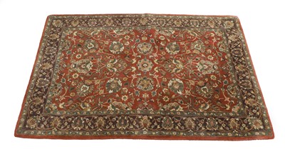 Lot 404 - A Tabriz rug