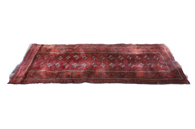 Lot 375 - A red Afghan runner