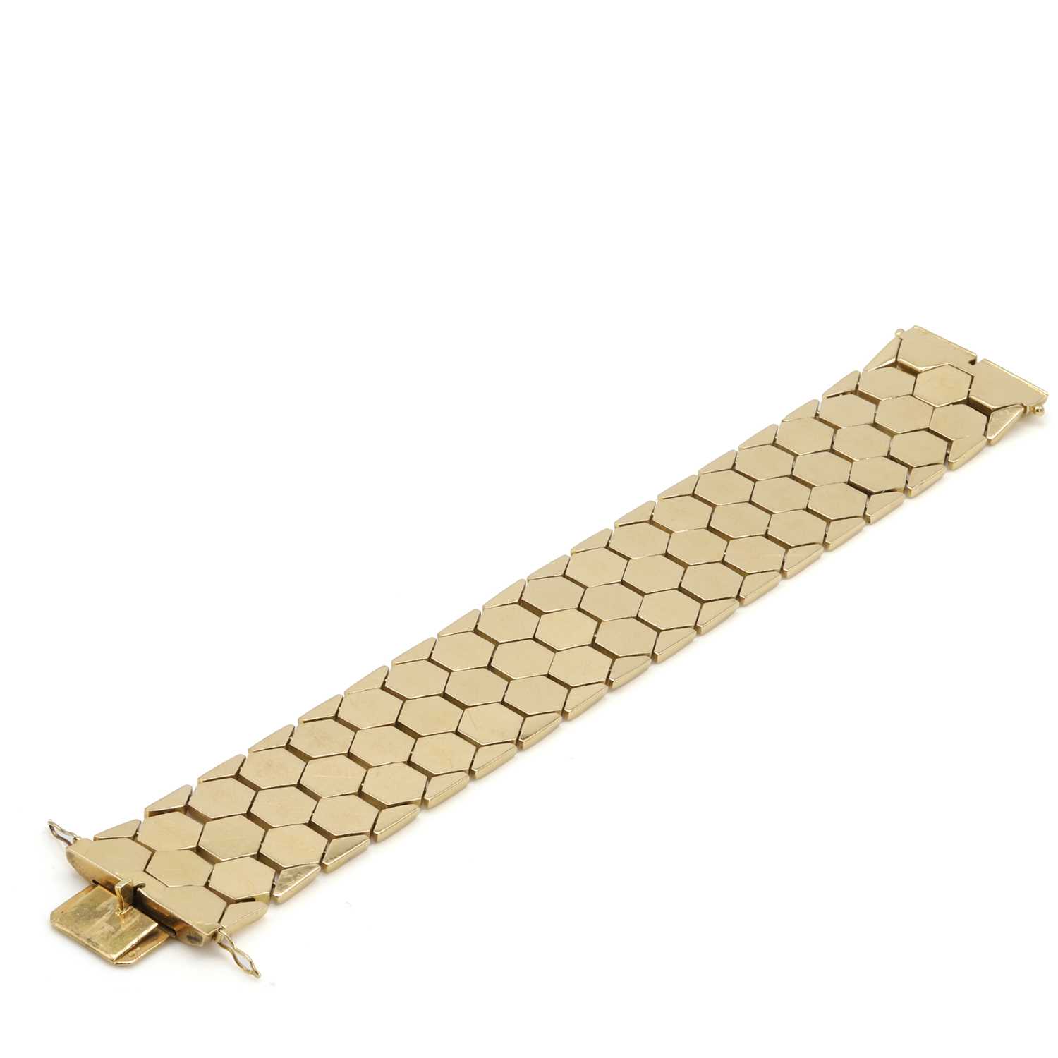 Lot 64 - A 14ct gold strap bracelet, c.1960s