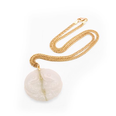 Lot 165 - A carved jade pendant necklace