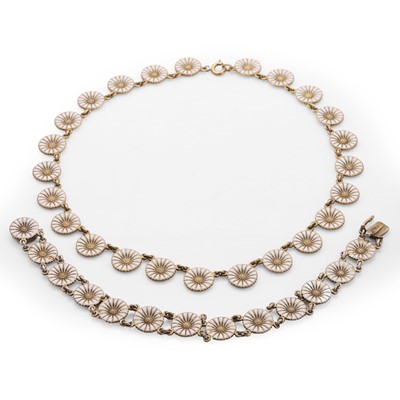 Lot 1120 - A silver gilt enamel daisy necklace and bracelet set, by Anton Michelsen