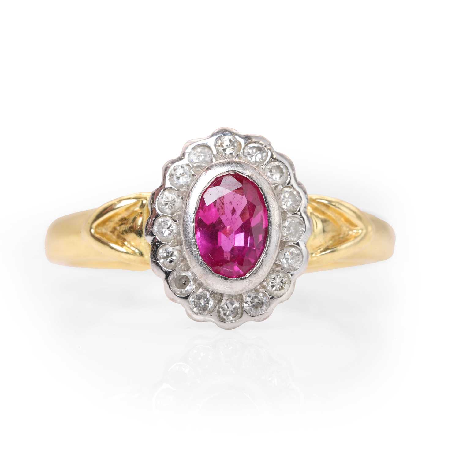 Lot 95 - An 18ct gold ruby and diamond cluster ring