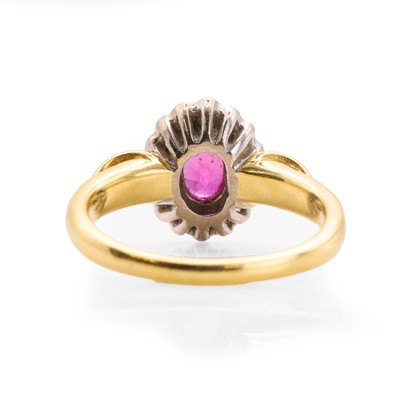 Lot 95 - An 18ct gold ruby and diamond cluster ring