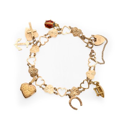 Lot 315 - A gold heart link charm bracelet