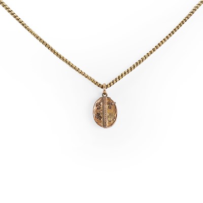 Lot 16 - A Victorian locket pendant and chain
