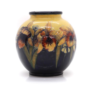 Lot 114 - A William Moorcroft pottery 'Orchid' pattern vase