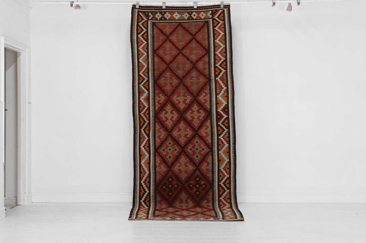 Lot 291 - A flat-weave kilim wool runner