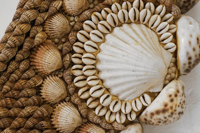 Lot 80 - A near pair of shell-encrusted mirrors attributed to Anthony Redmile