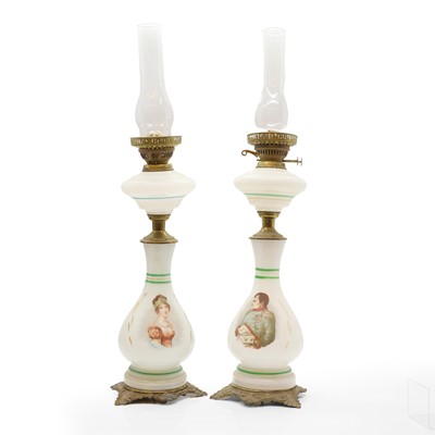Lot 424 - A pair of opaline glass oil lamps