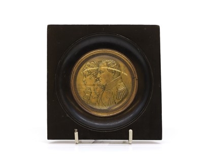 Lot 293 - A circular gilt bronze portrait