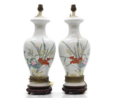 Lot 251 - A pair of opaline glass lamps