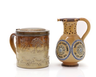 Lot 108 - A large Doulton salt glazed harvest tankard