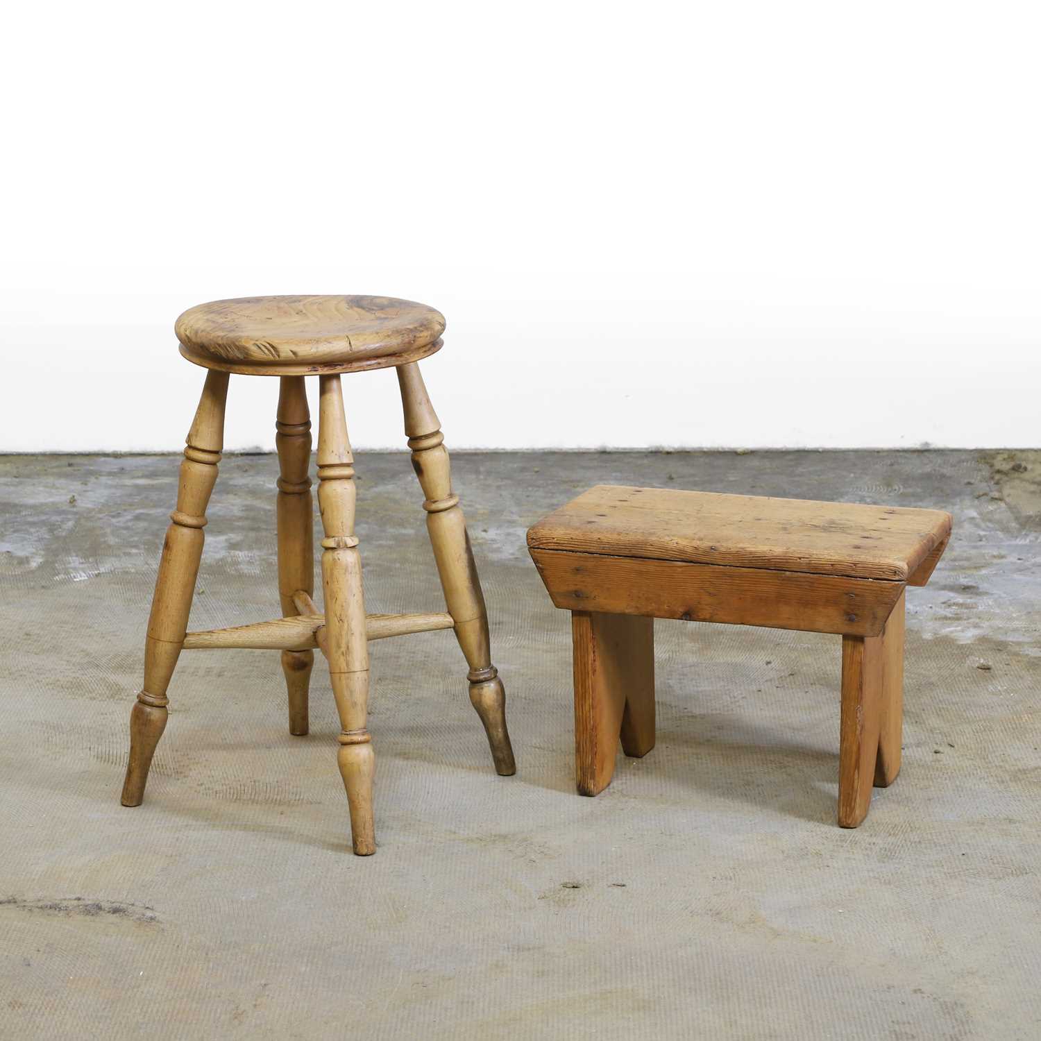 Lot 501 - A primitive pine milking stool