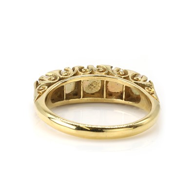 Lot 32 - An opal and diamond five stone ring