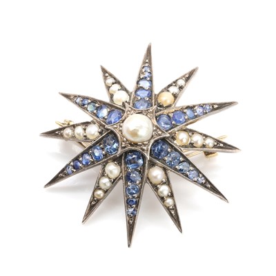 Lot 17 - A Victorian sapphire and split pearl star brooch, c.1880