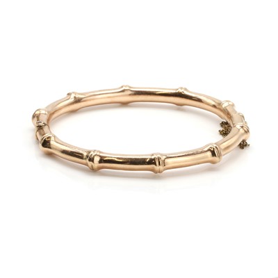 Lot 28 - An antique 9ct rose gold hinged bangle