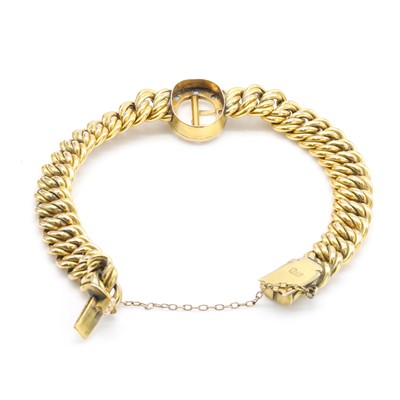 Lot 24 - An Edwardian split pearl and sapphire bracelet