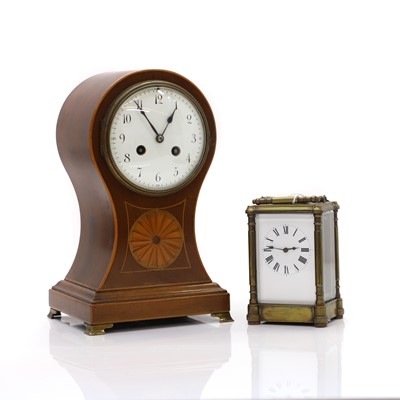 Lot 208 - An Edwardian inlaid mahogany balloon-shaped mantel clock