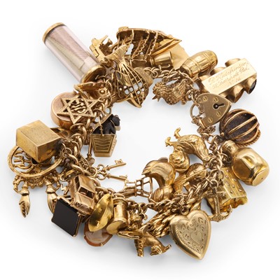 Lot 314 - A 9ct gold charm bracelet
