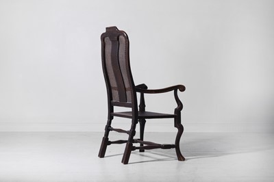 Lot 278 - A baroque walnut and cane open armchair