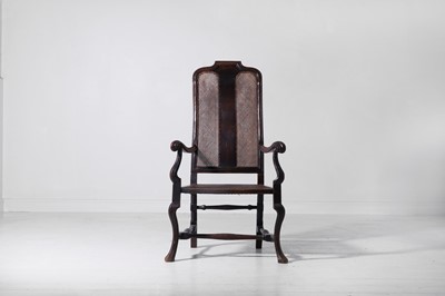 Lot 278 - A baroque walnut and cane open armchair