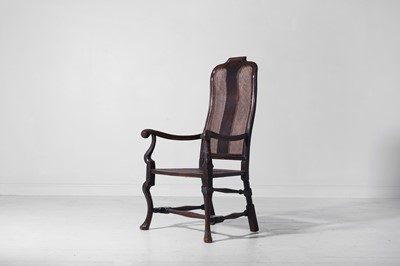 Lot 278 - A baroque walnut and cane open armchair