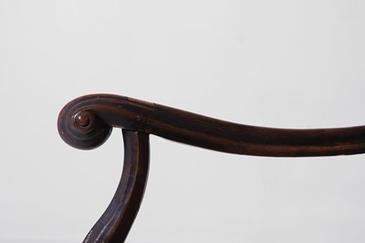Lot 278 - A baroque walnut and cane open armchair