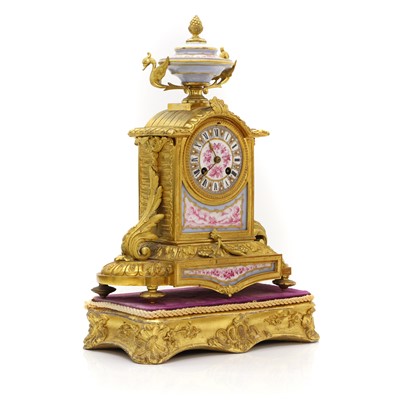 Lot 205 - A French gilt-brass mantel clock