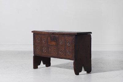 Lot 97 - A small boarded oak chest