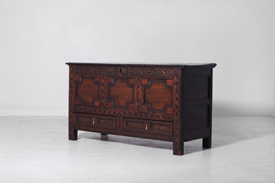 Lot 209 - A carved oak chest