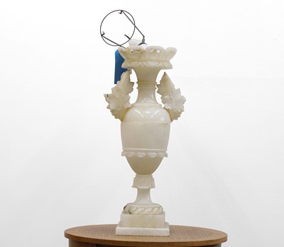Lot 475 - A white onyx table lamp