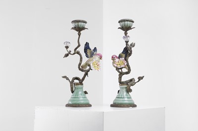 Lot 90 - A pair of gilt-metal and porcelain candlesticks