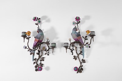 Lot 195 - A pair of ormolu and porcelain parrot wall lights