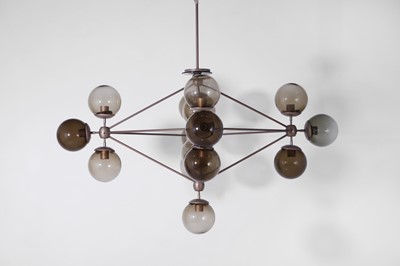 Lot 470 - A modernist metal and smoked glass 'Modo' chandelier by Roll & Hill