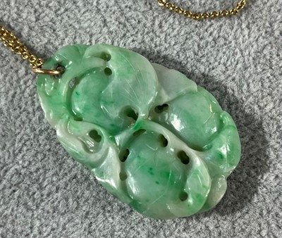 Lot 30 - A carved jade pendant, c.1920s