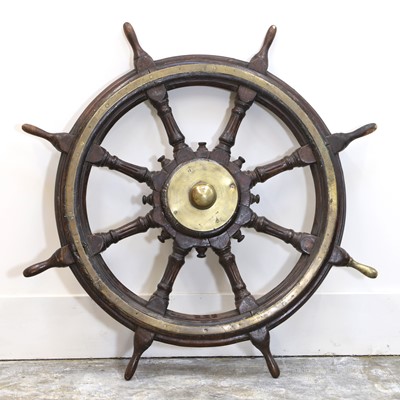 Lot 303 - An oak and brass-mounted ship's wheel
