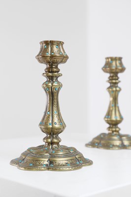 Lot 329 - A pair of small brass candlesticks