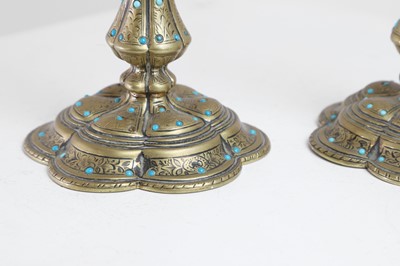 Lot 329 - A pair of small brass candlesticks