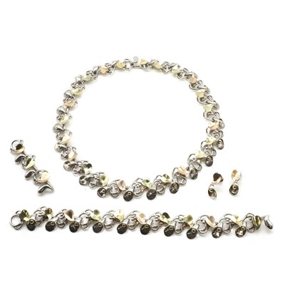 Lot 163 - A silver and two-tone gold necklace, bracelet and earrings set, attributed to Brett Payne