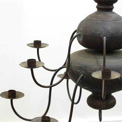 Lot 480 - A Swedish vernacular patinated metal twelve-branch chandelier