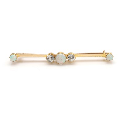 Lot 31 - An Edwardian opal and diamond bar brooch