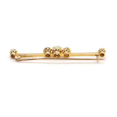 Lot 31 - An Edwardian opal and diamond bar brooch