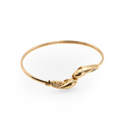 Lot 52 - A diamond set gold torque bangle