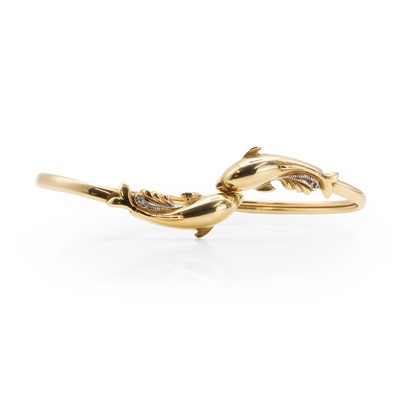 Lot 52 - A diamond set gold torque bangle