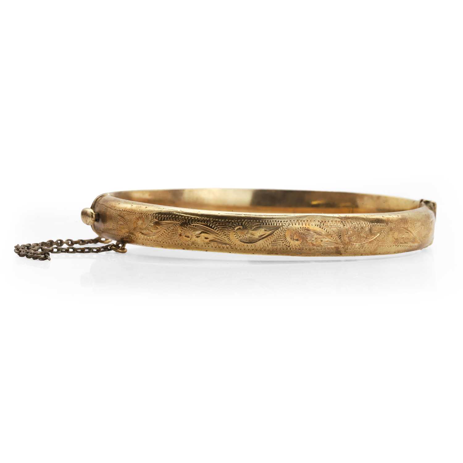 Lot 75 - A 9ct gold hinged bangle
