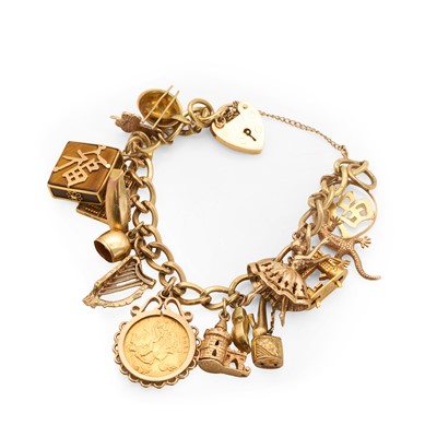 Lot 318 - A gold charm bracelet