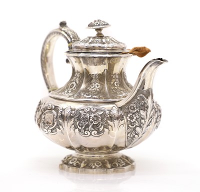Lot 12 - A George III silver teapot