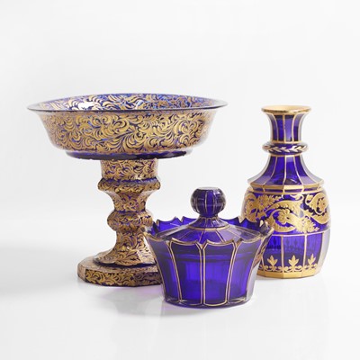 Lot 161 - A collection of gilt blue glass