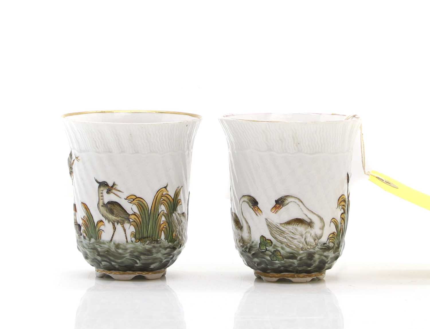 Lot 71 - A pair of porcelain beakers