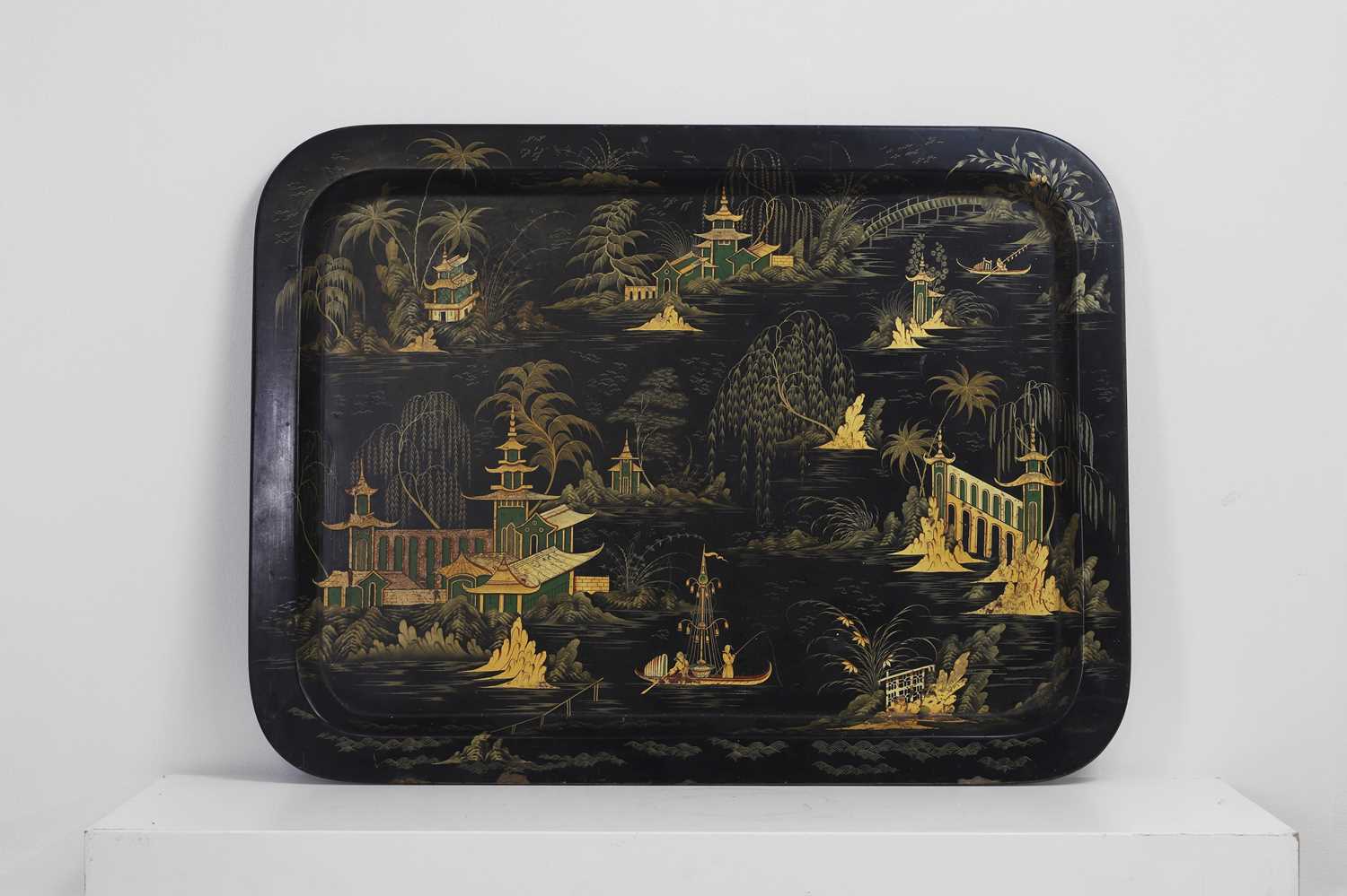 Lot 368 - A Victorian parcel-gilt and black-lacquered papier mâché tray by Jennens & Bettridge